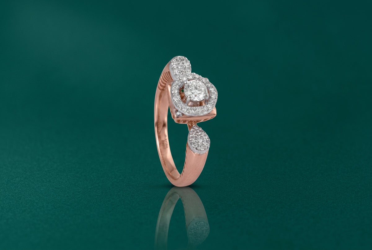 A gold ring with multiple diamond accents, featuring a prominent central diamond, with a reflective surface below.