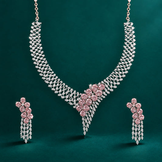A necklace and earring set with a geometric pattern, featuring a pink and white color scheme, with intricate designs.