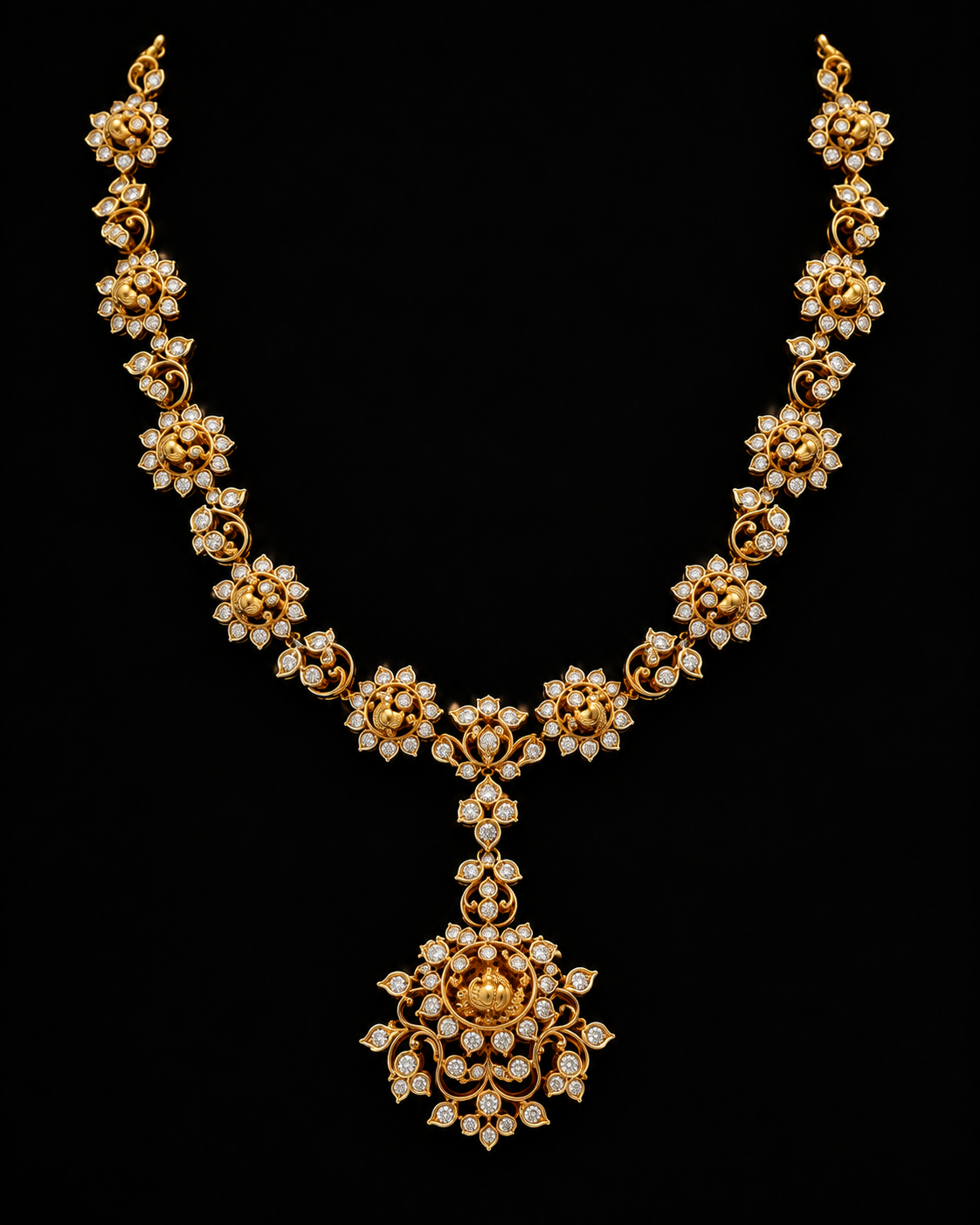 An Yellow gold necklace with a large central pendant, decorated with numerous small LAB GROWN DIAMOND  in floral and scroll motifs, displayed against a solid black background.