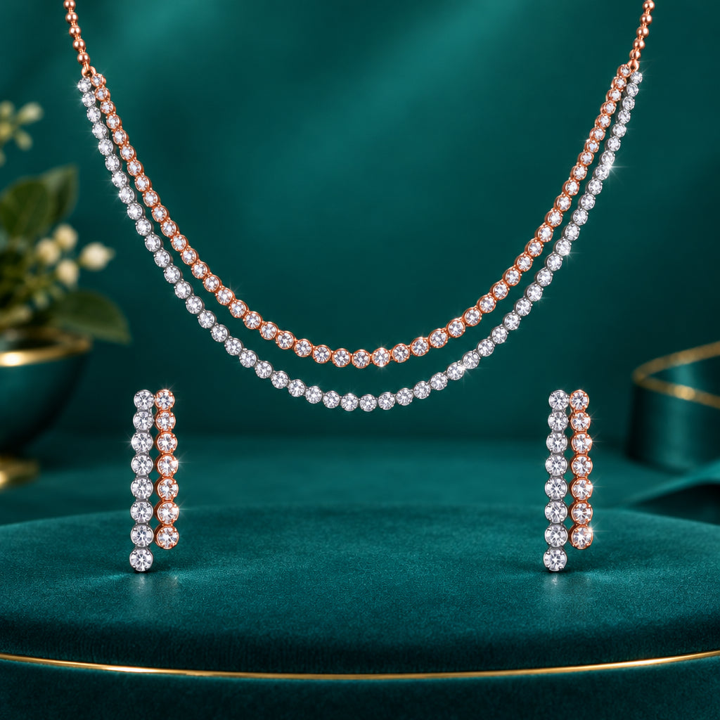 A two-tone diamond necklace with a matching pair of earrings, the necklace consisting of two strands of round-cut diamonds.