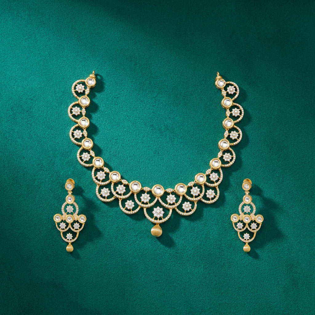A gold-colored diamond-studded necklace and earring set.